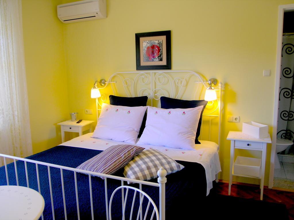 House Rozi Hotel Palit Bagian luar foto